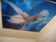 Подвесной потолок с изображением в спальне